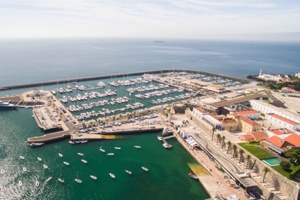 Cascais marina and coastal promenade at golden hour perfect location for retiring in Portugal