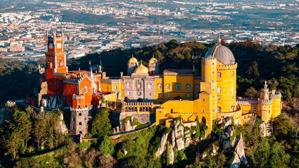 Pena Palace in Sintra, Portugal – vibrant red and yellow hilltop castle overlooking Lisbon