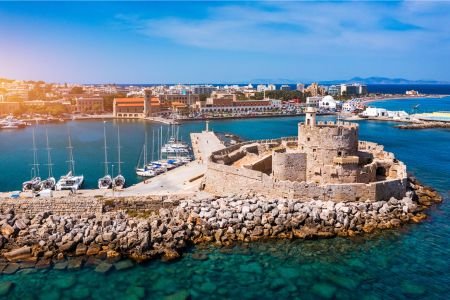 Rhodes Old Town and Mandraki Harbour with medieval fort and yachts, Greece