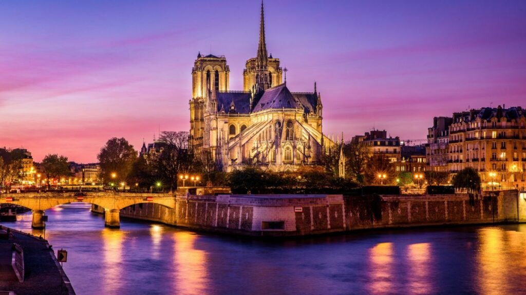 Notre-Dame Cathedral at sunset viewed from the Seine River, Paris, France