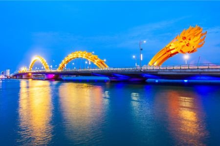 Best country to retire.  Retiring in Vietnam: Dragon Bridge in Da Nang illuminated at night