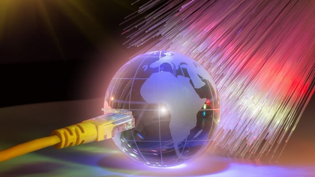 Global connectivity concept showing network cable connected to a digital globe, representing the best travel cables for worldwide use